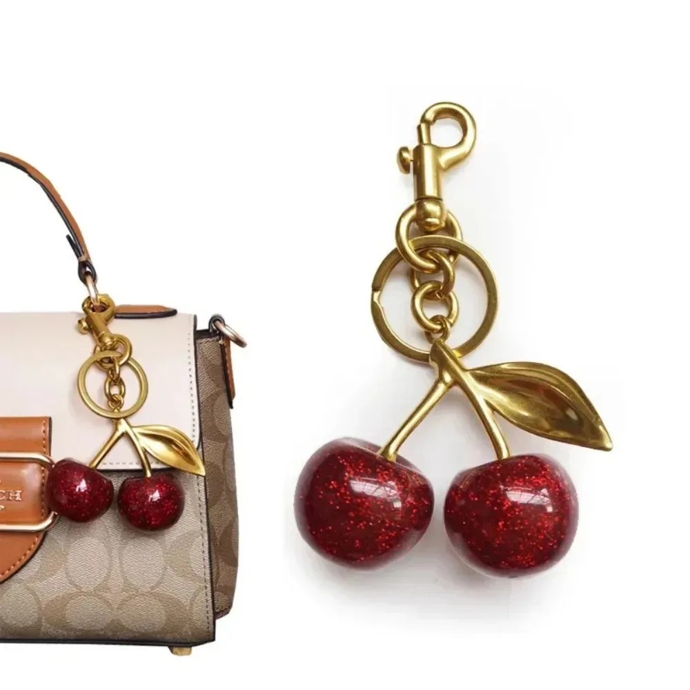 จี้ห้อยกระเป๋าคริสตัลเชอร์รี่ส - Women Bags Coach บทวิจารณ์และราคา